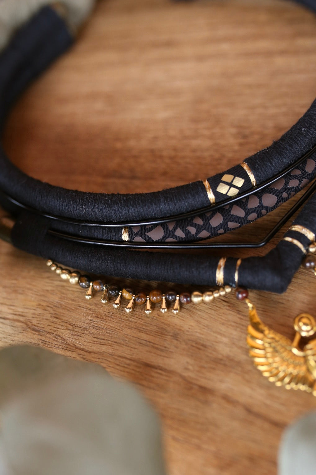 Collier a trois rangs