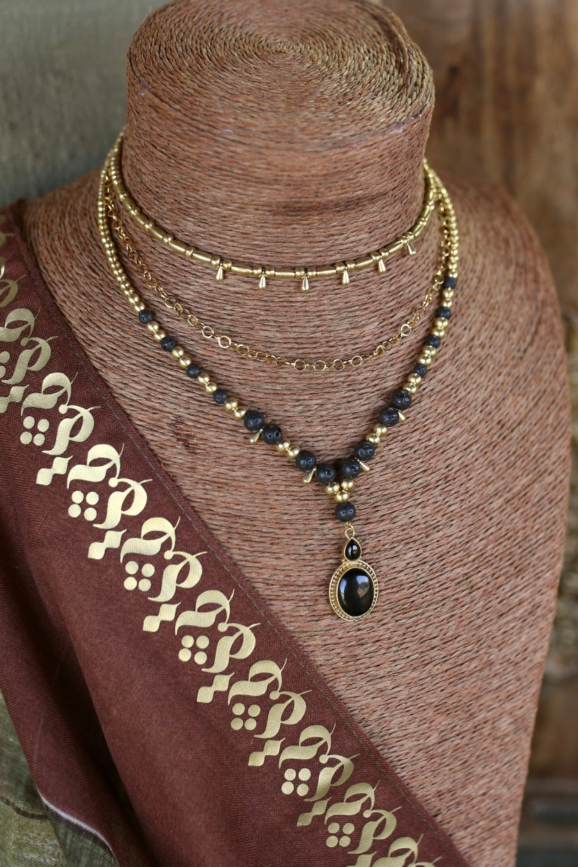 Collier a trois rangs