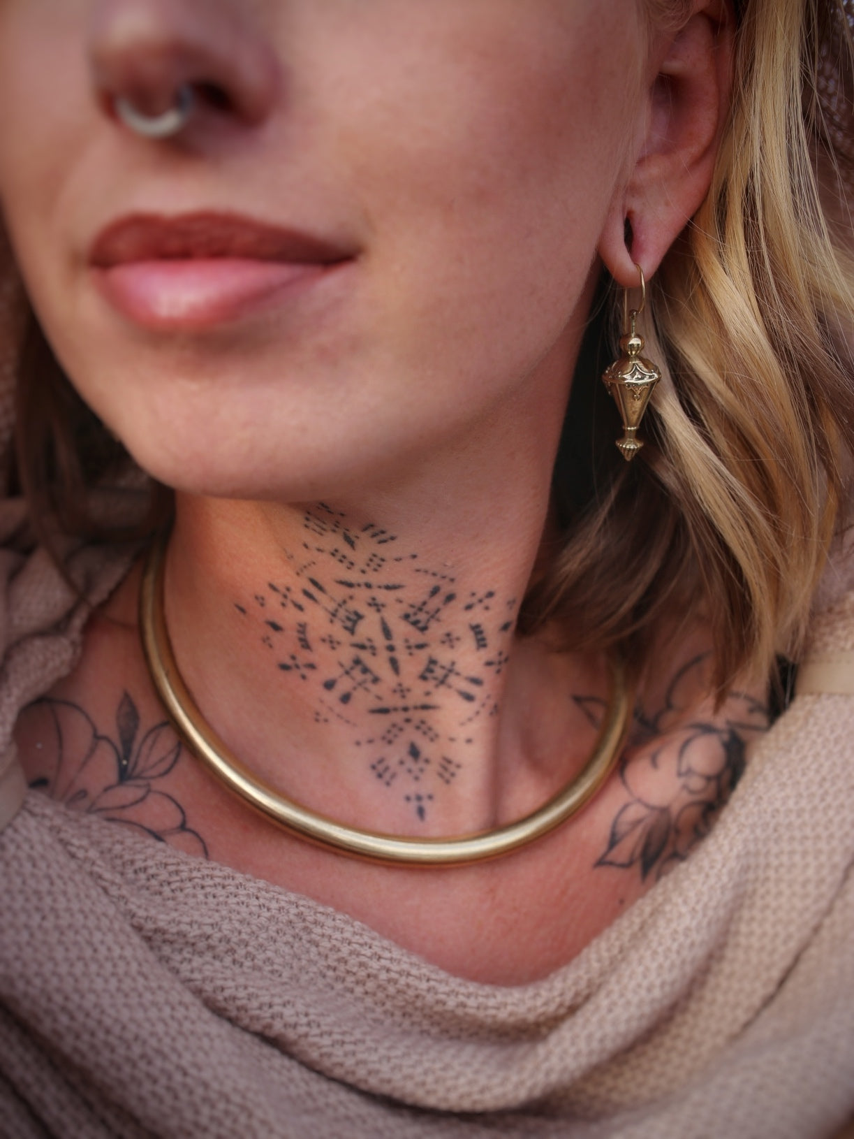 Boucle d'oreille en laiton