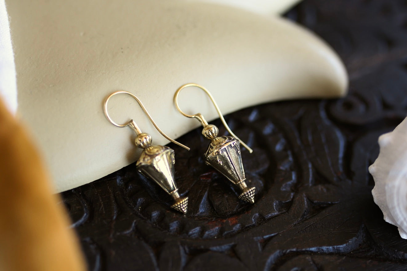 Boucle d'oreille en laiton
